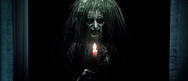 Insidious+woman+with+candle.jpg